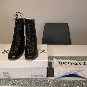 Schutz black patent leather lace up/ side zip ankle boots . Size 8 B